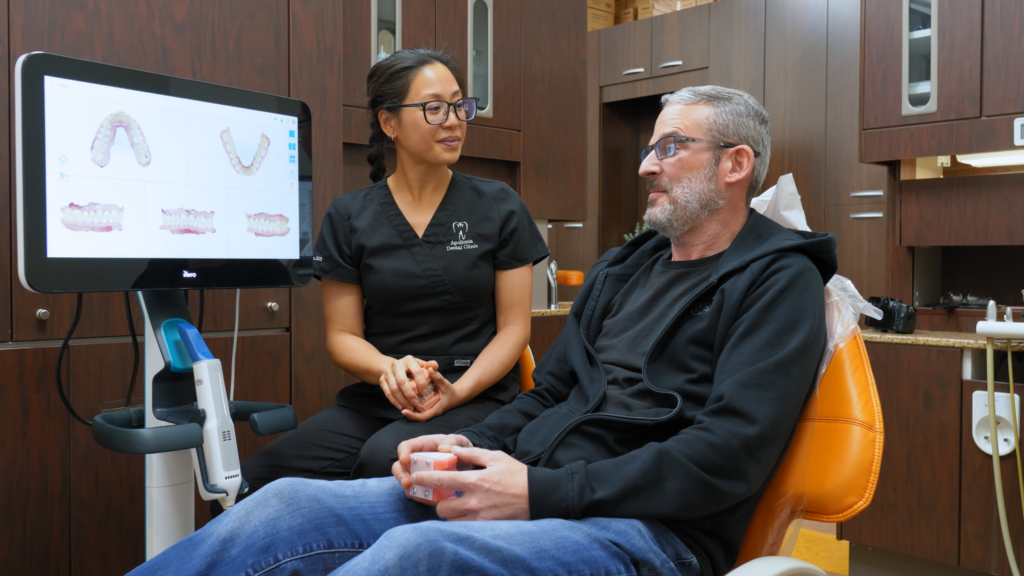 Family dentist treating a patient at Apollonia Dental Clinic