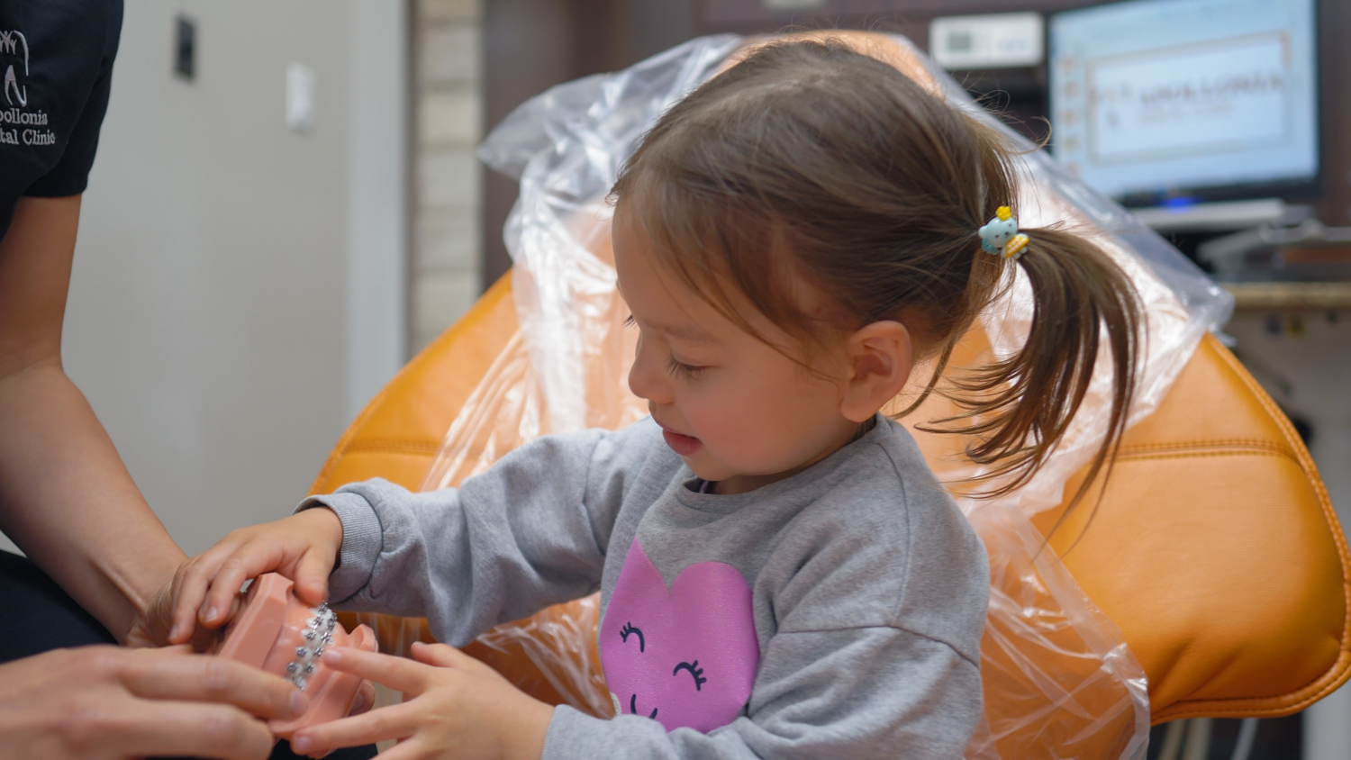 Child patient receiving dental care at Apollonia Dental Clinic Edmonton